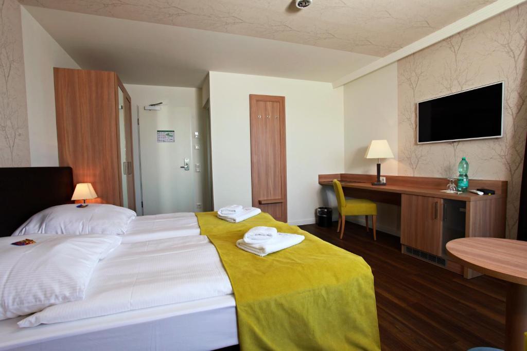 Hotel Warnow Rostock Quarto foto